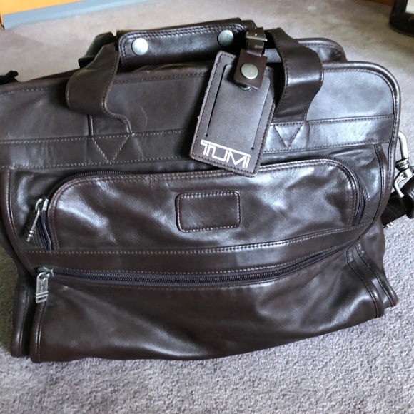 tumi leather travel bag